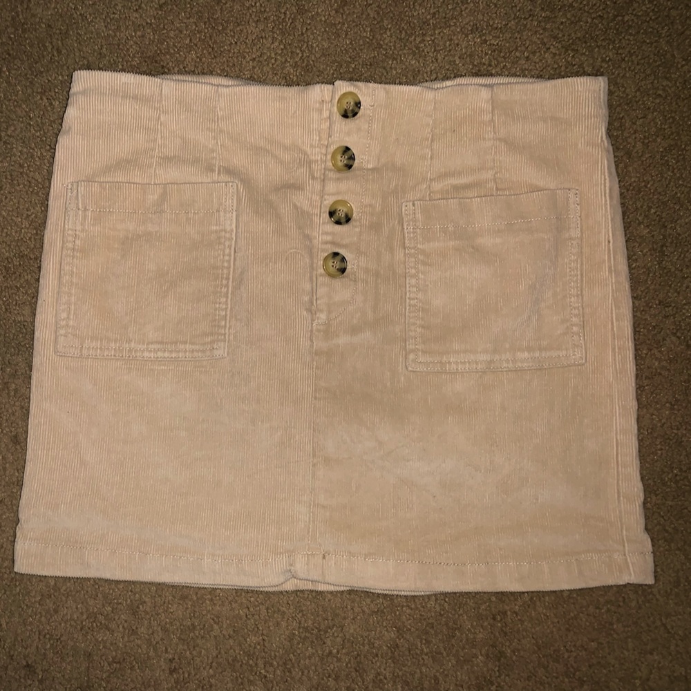 Like new! Pull on; tan corduroy, pencil mini skirt! Dress up or down!
